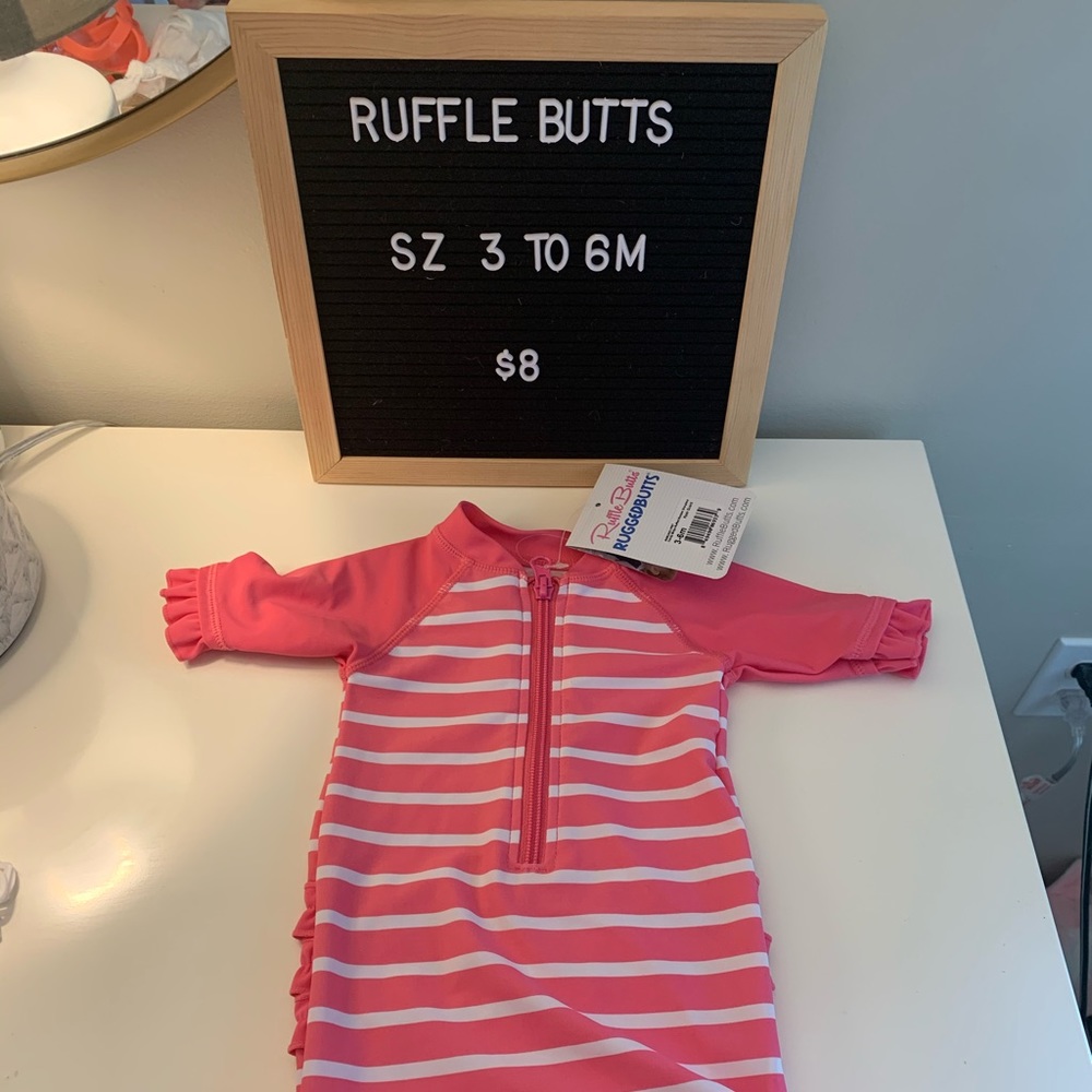 Ruffle Butts zip one piece